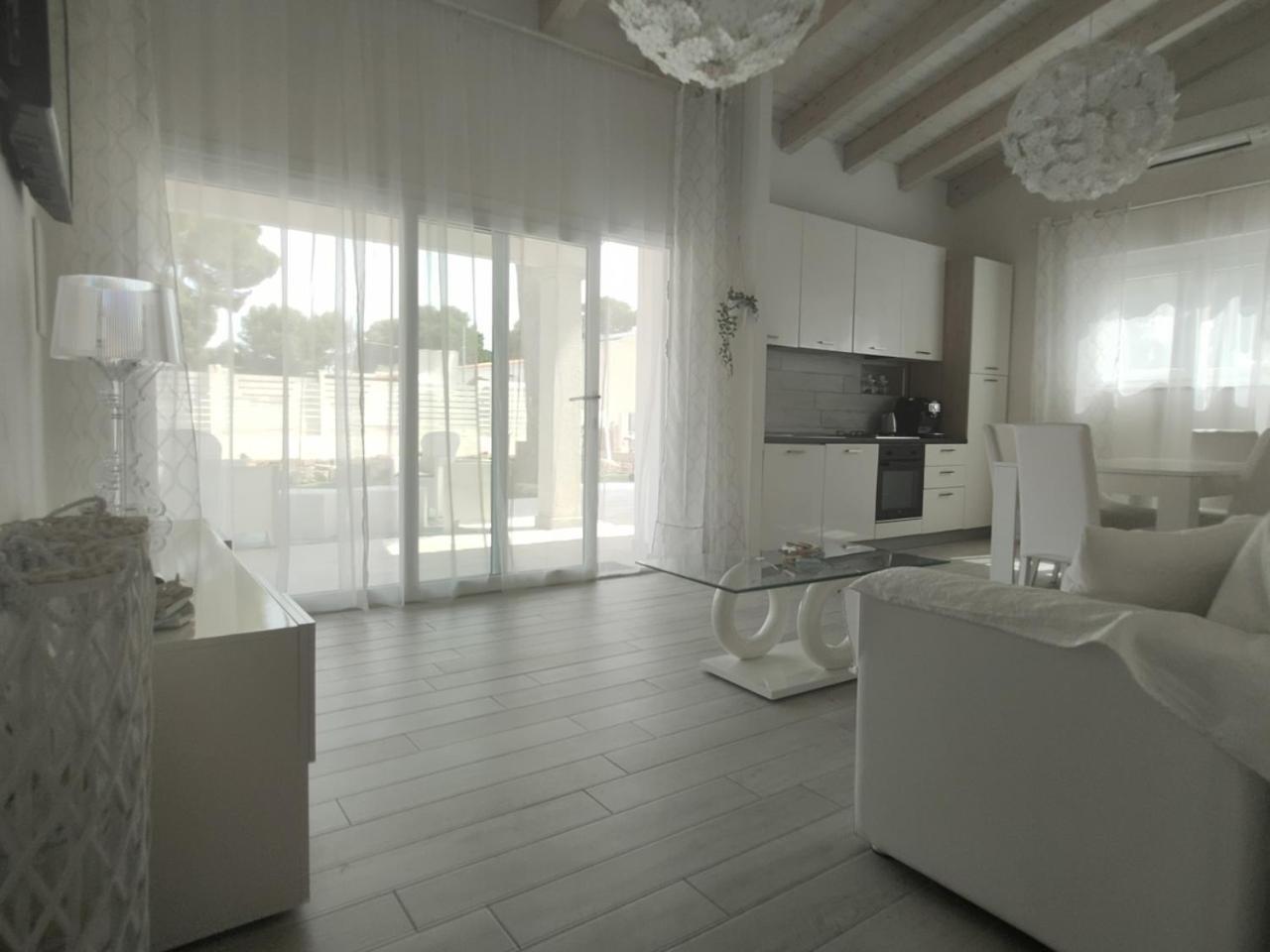 Ikebana Villas Porto Pino Beach Buitenkant foto